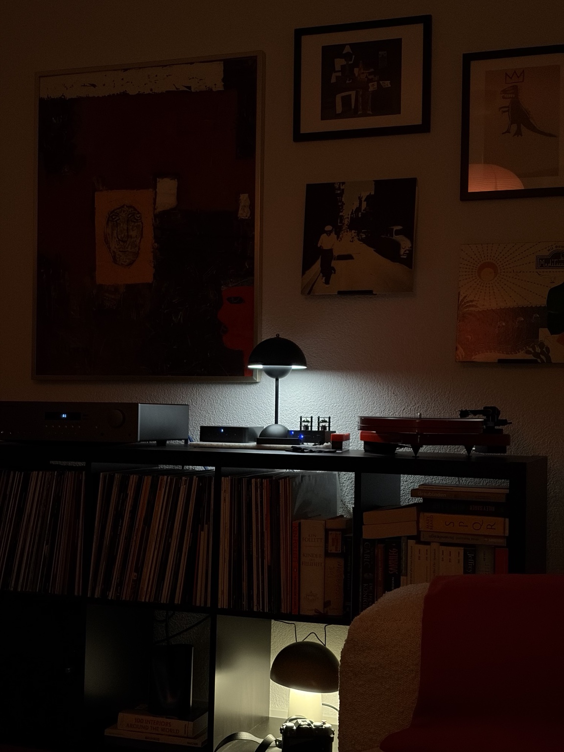 Marvin’s listening room with a record player, vinyl collection, framed art and soft evening light